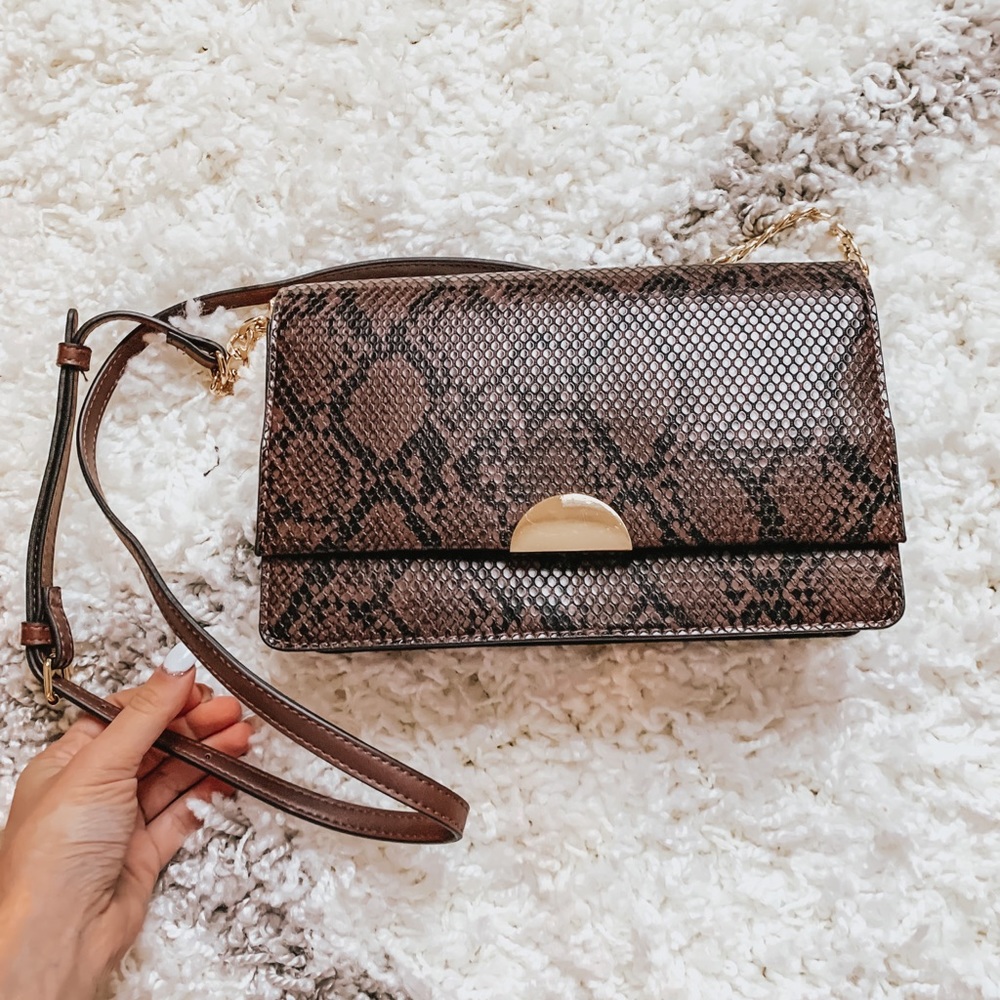 A new day new snakeskin crossbody bag